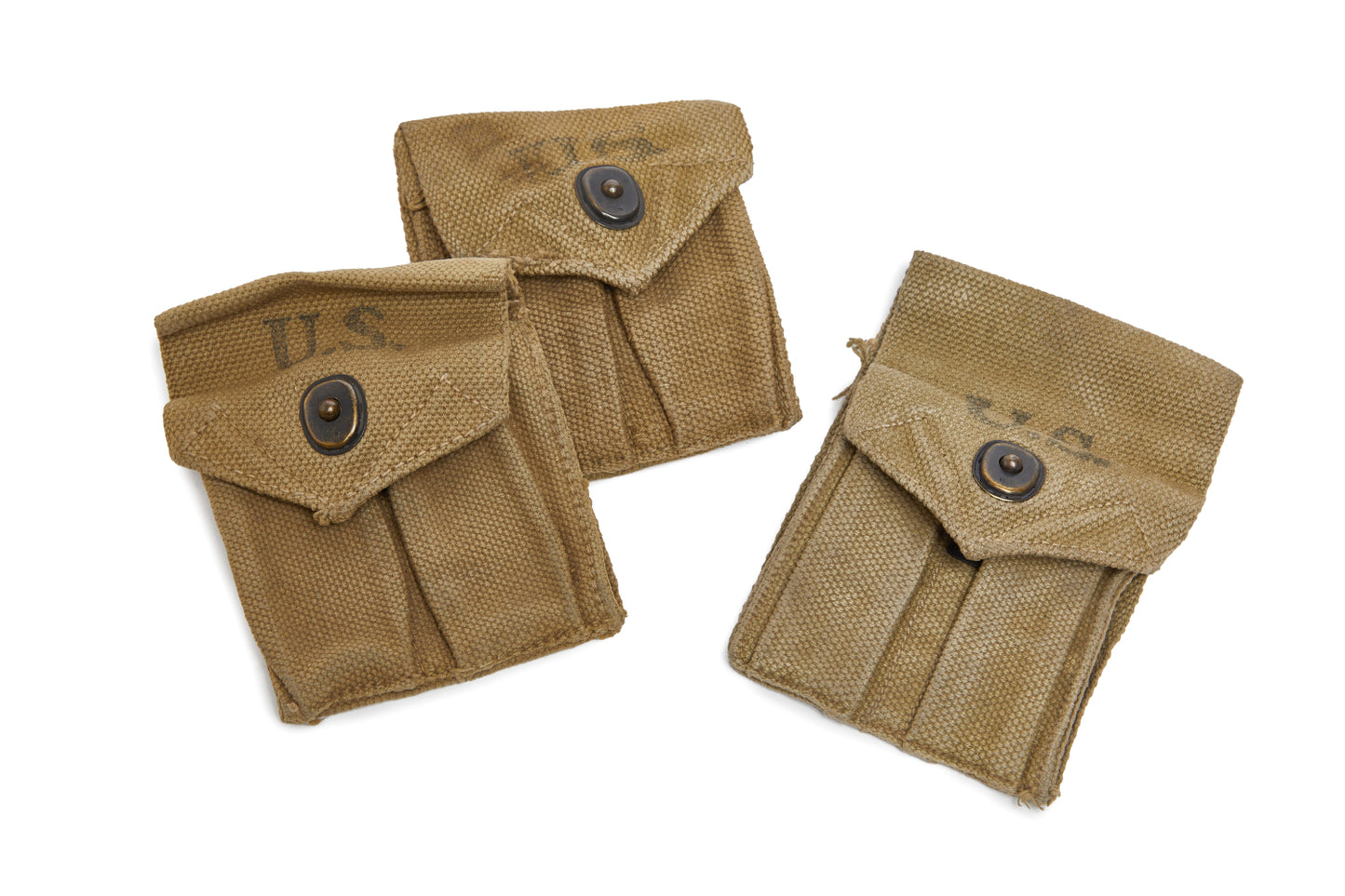 Three brown pouches with 'U.S.' marking on a white background