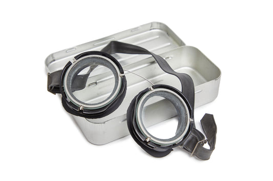 Metallic container with goggles on a white background