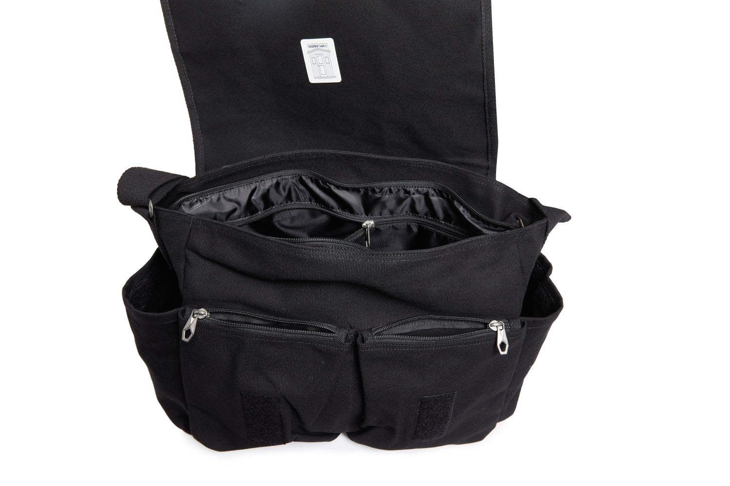 Black bag with open compartments on a white background