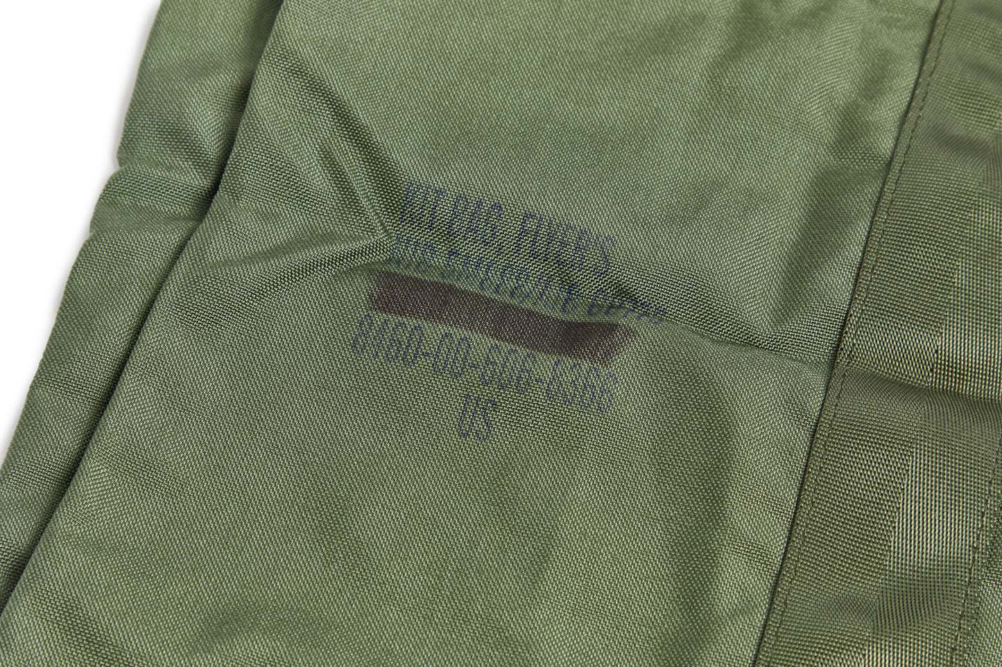 Green bag with handles on a white background