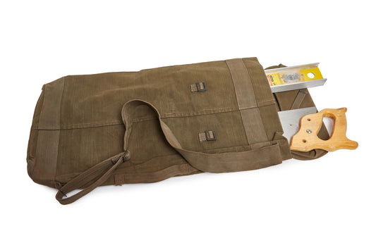 Brown bag with tools on a white background