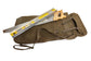 Brown bag with a ruler and wooden tool on a white background
