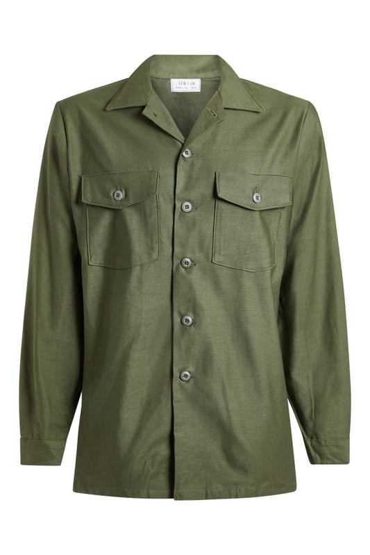 Green shirt with two front pockets on a white background