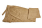Folded khaki pants on a white background