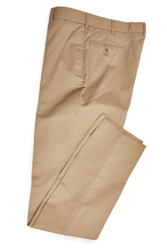 Folded khaki pants on a white background
