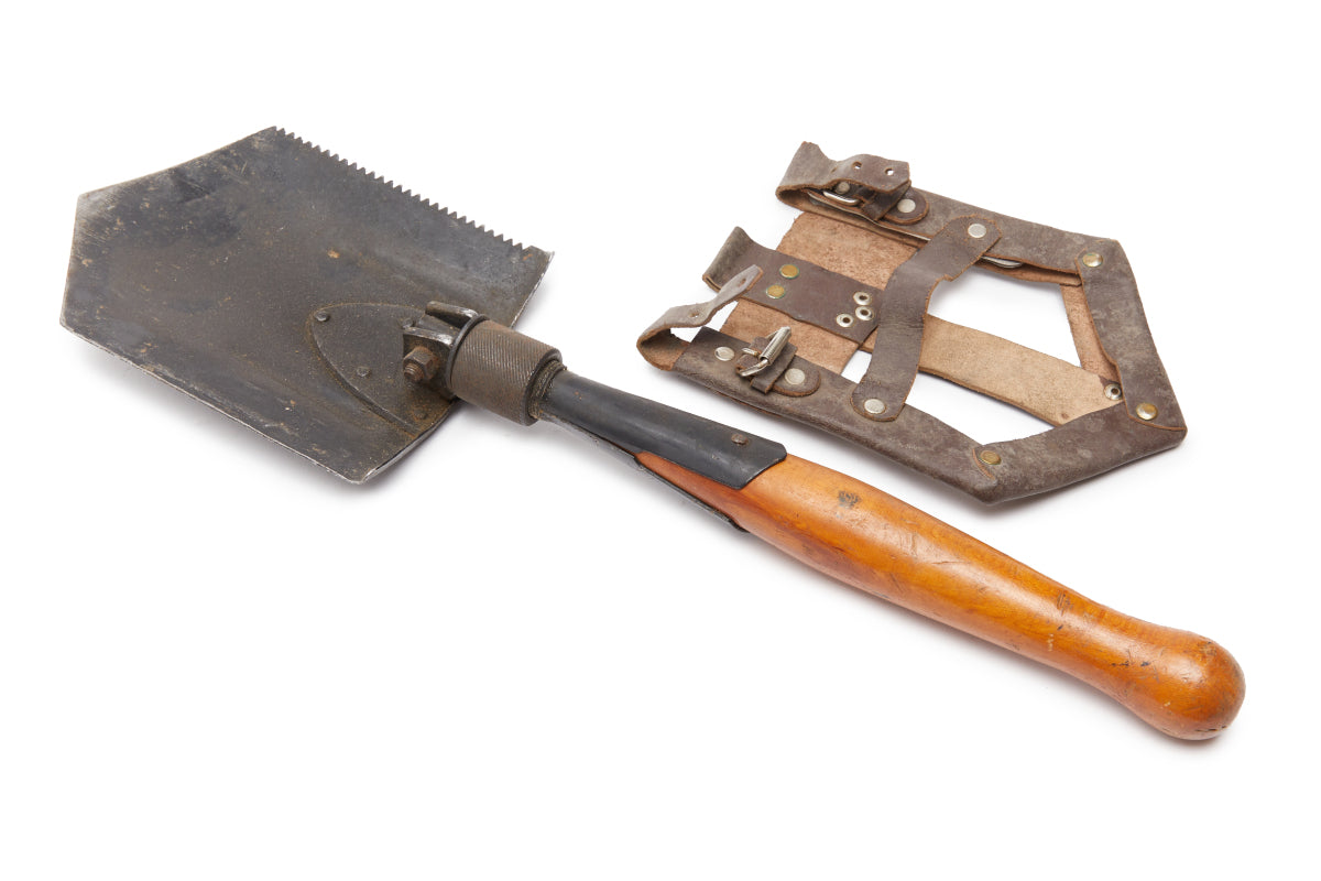 shovel with a wooden handle and metal blade on a white background