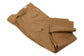 Folded brown pants on a white background