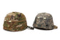 Two camouflage military helmets on a white background