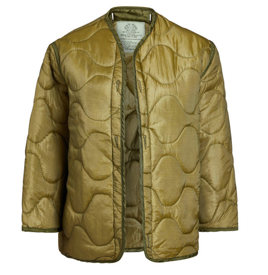 Quilted jacket with a textured pattern on a white background