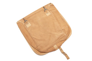 Brown bag with straps on a white background