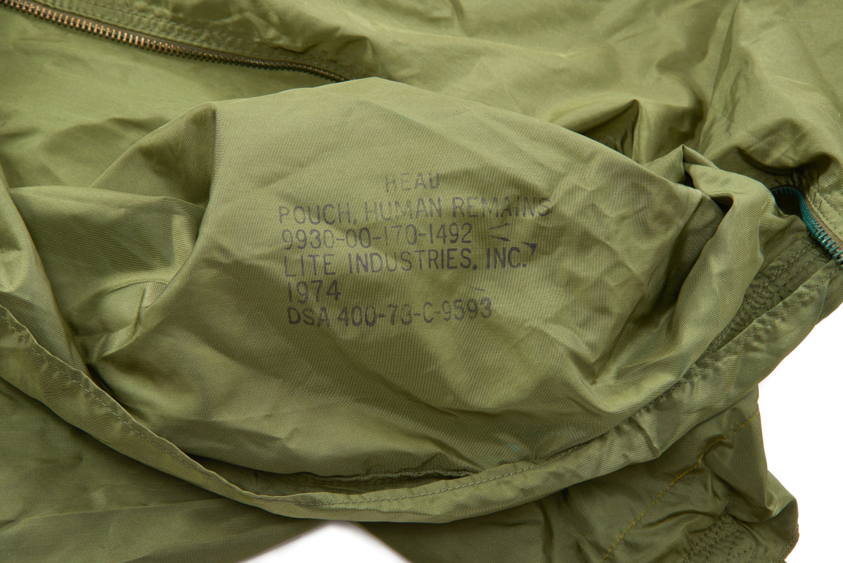 Close-up of a military-style pouch with branding marking