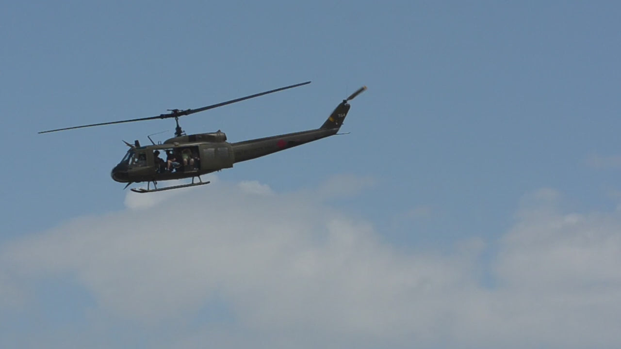 Video with Helicopter and aircraft carrier and military inspired bags in different styles