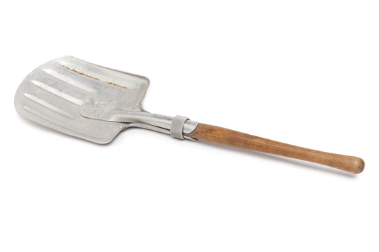Metal shovel with wooden handle on a white background